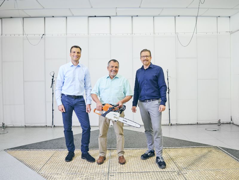 Group picture with chainsaw.