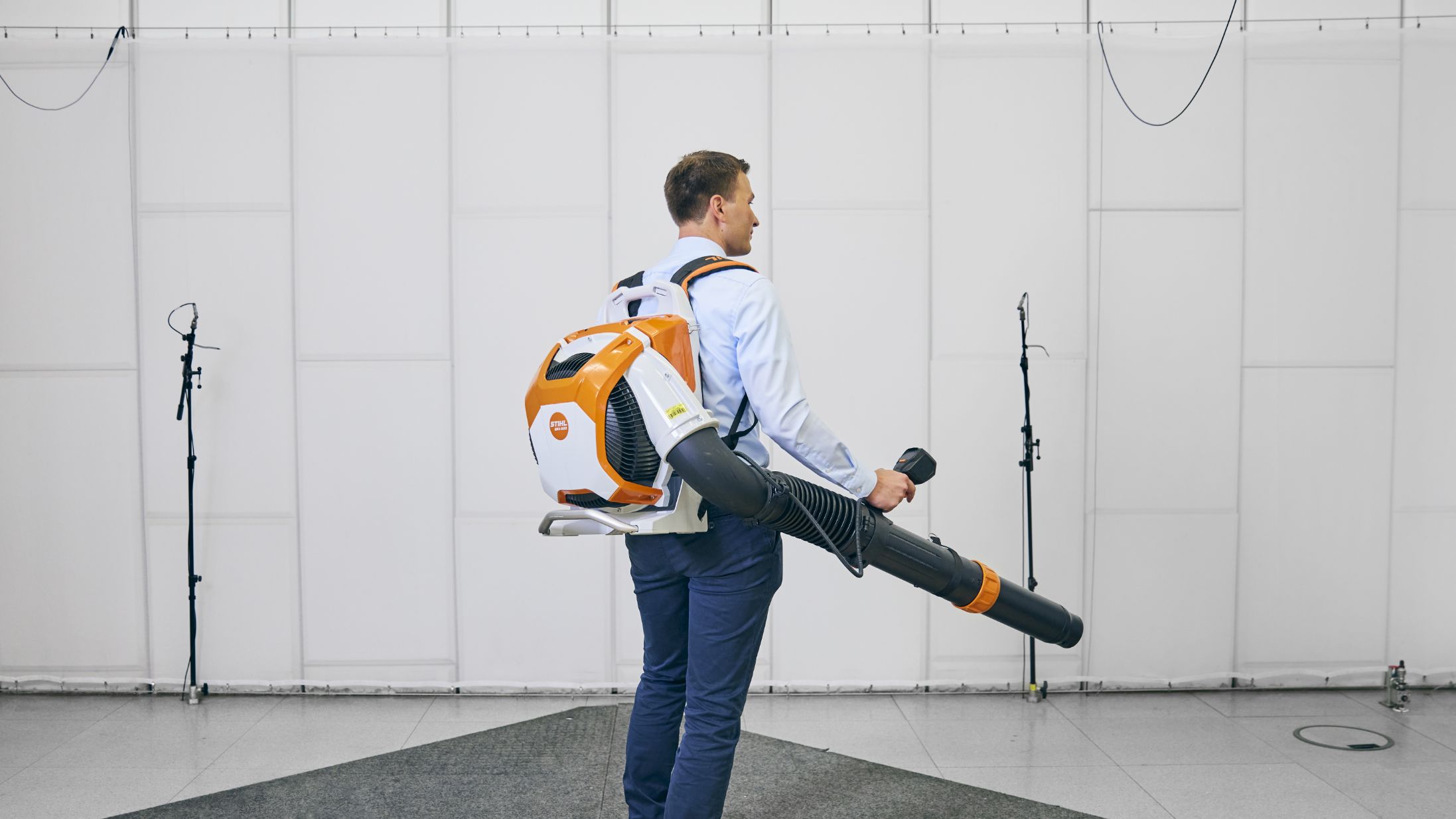 Man with leaf blower.