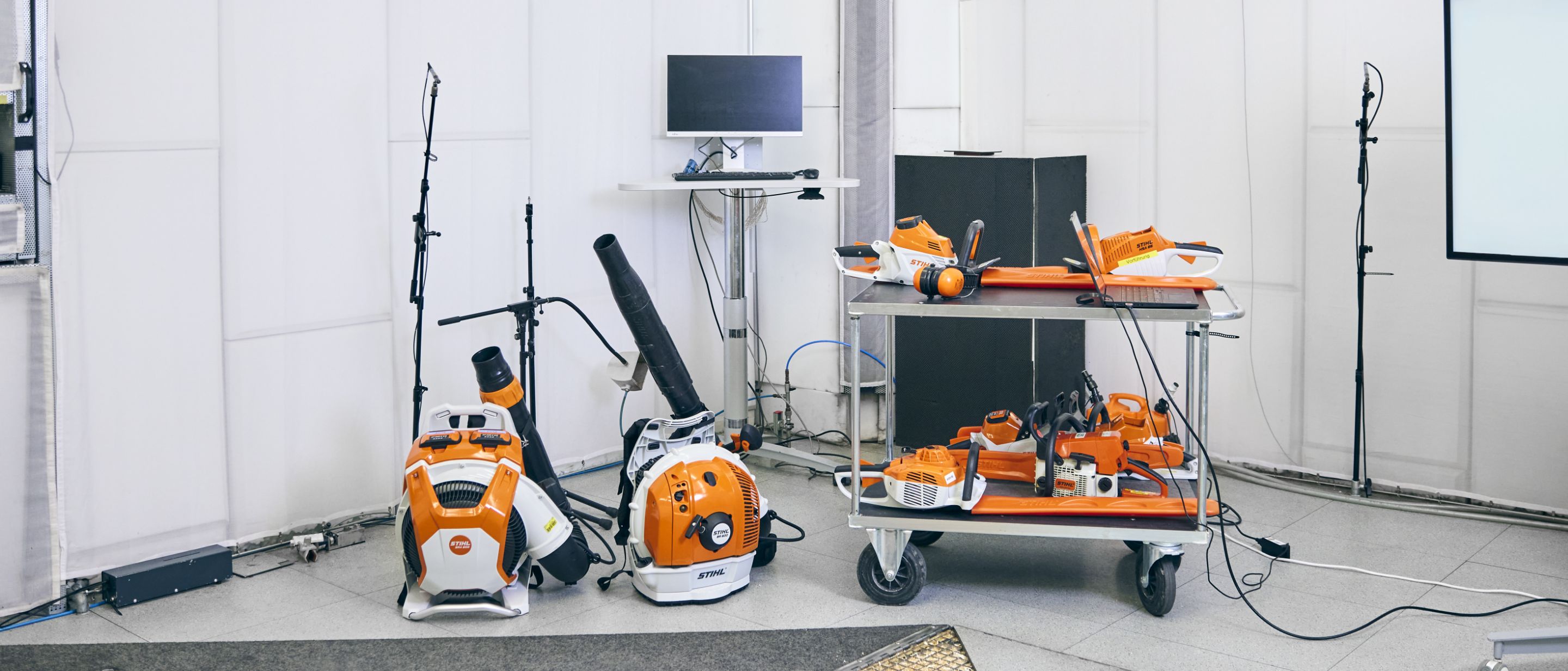 Still life composed of various STIHL power tools.