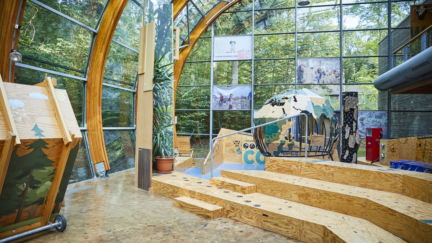 A bright room with glass and wooden elements