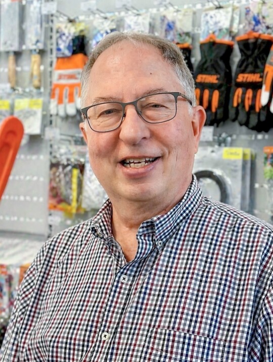 A portrait photo of Sam Madsen.