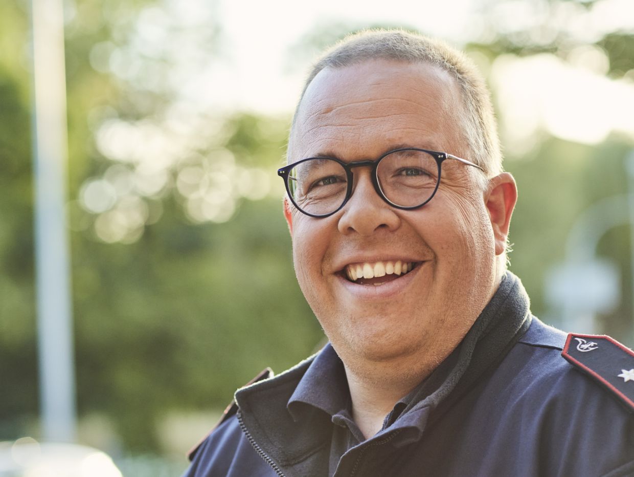 Michael Fuchs laughs into the camera.