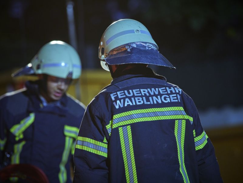 Firefighters of the Waiblingen fire service with helmets and protective clothing.