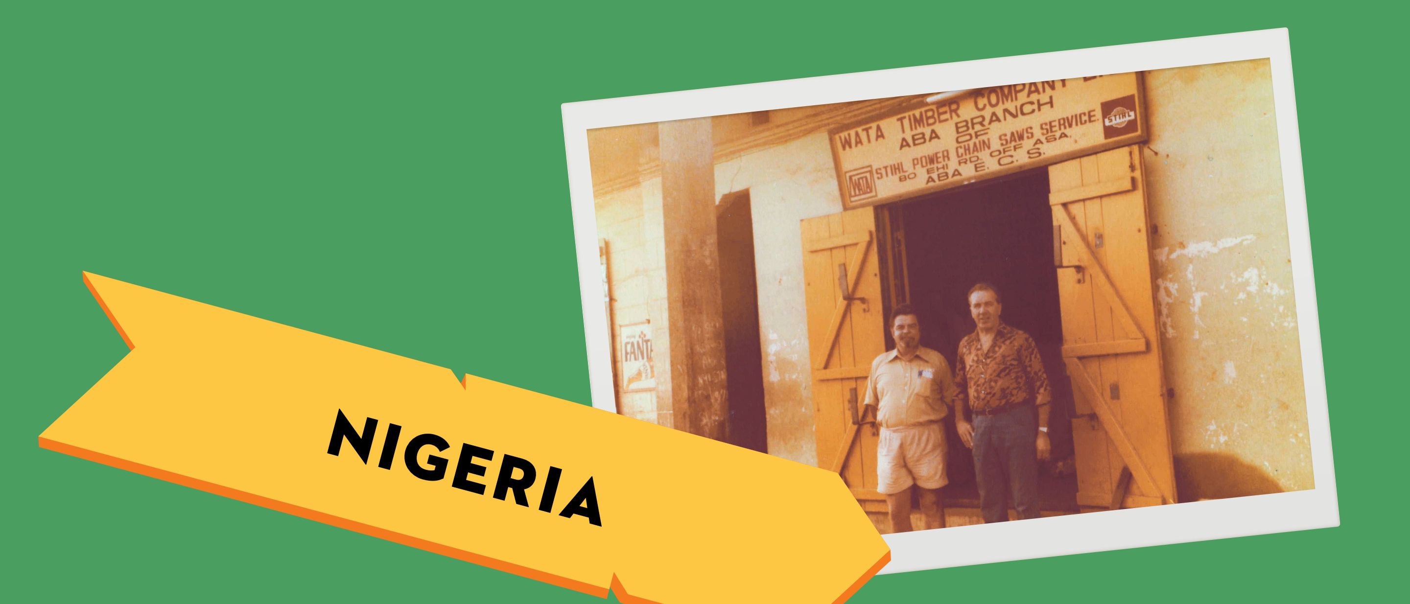 Julius W&ouml;rz in Nigeria, standing with a dealer in front of a store selling STIHL power tools.
