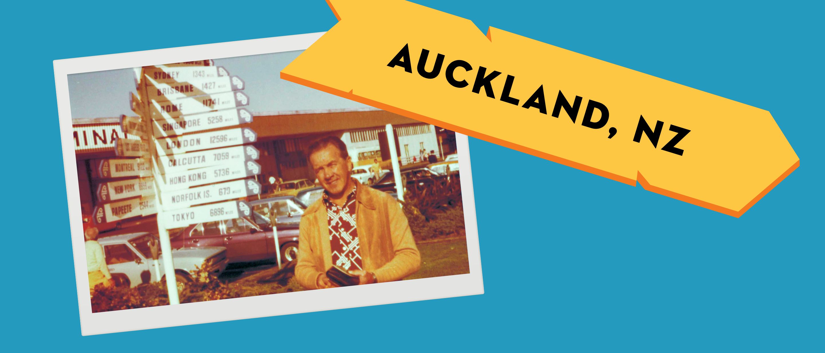 Julius W&ouml;rz in 1965 beside a signpost in Auckland, New Zealand.